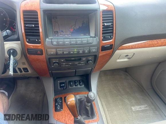 2005 Lexus GX 470 z VIN JTJBT20X050076167, wystawiony jako Copart lot #59916595 z przebiegiem 297 768 mil mil oraz Czysty tytuł • Clean title. Historia ofert i sprzedaży dostępna na DreamBid. Obrazek 9.