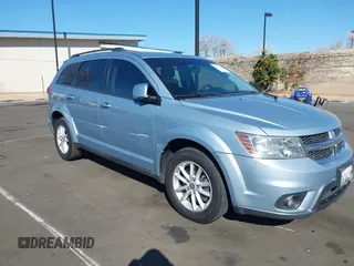 2013 Dodge Journey SXT with VIN 3C4PDCBG5DT674863, listed as a IAAI auction lot 41670225 with 207,524 mi miles. Bid and sale history available at carsss.com. Image 6.