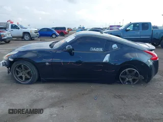 2015 Nissan 370Z Sport with VIN JN1AZ4EH8FM443095, listed as a IAAI auction lot 41105775 with 135,354 mi miles. Bid and sale history available at carsss.com. Image 14.