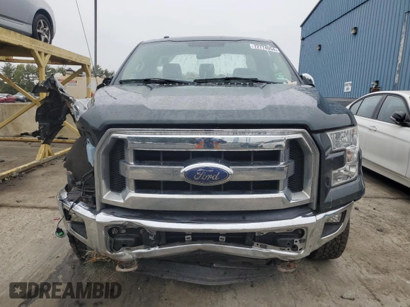 2015 Ford F-150 XL with VIN 1FTNF1EG1FKD00398, listed as a Copart auction lot 72774054 with 164,052 mi miles and Salvage title. Bid and sale history available at DreamBid. Image 5.