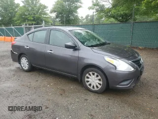 2015 Nissan Versa SV with VIN 3N1CN7AP6FL803252, listed as a Copart auction lot 61076555 with 84,161 mi miles and Salvage title. Bid and sale history available at DreamBid. Image 4.