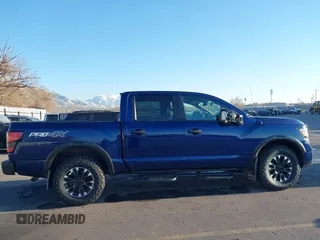 2021 Nissan Titan Pro-4X z VIN 1N6AA1ED1MN517476, wystawiony jako IAAI lot #41422217 z przebiegiem 62 650 mil mil oraz . Historia ofert i sprzedaży dostępna na DreamBid. Obrazek 13.