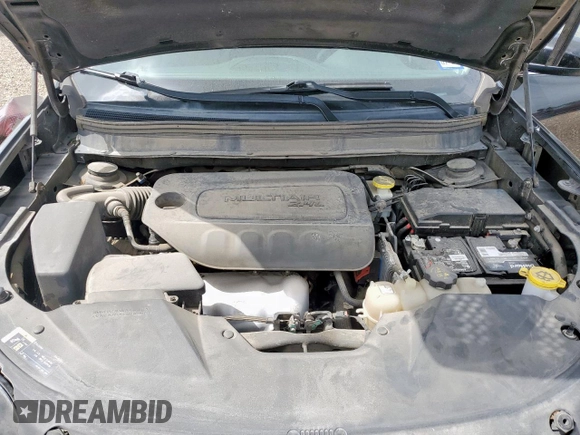 2019 Jeep Cherokee Latitude with VIN 1C4PJLCB6KD264183, listed as a Copart auction lot 64871745 with 121,556 mi miles and Salvage title. Bid and sale history available at DreamBid. Image 11.