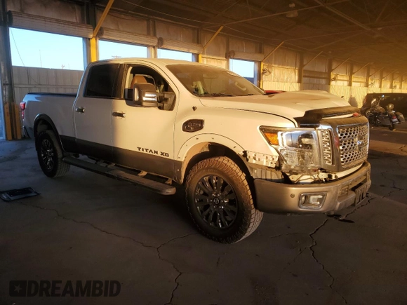2016 Nissan Titan XD Platinum Reserve with VIN 1N6BA1F42GN512715, listed as a Copart auction lot 88910205 with 85,364 mi miles and Salvage Title. Bid and sale history available at carsss.com. Image 4.