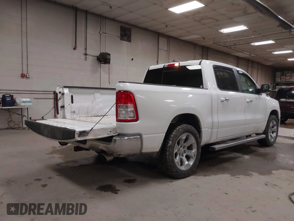 2019 Ram 1500 Big Horn/Lone Star with VIN 1C6SRFFT7KN645776, listed as a IAAI auction lot 41395240 with 136,068 mi miles. Bid and sale history available at carsss.com. Image 4.