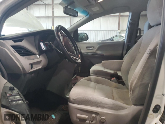 2016 Toyota Sienna LE AAS with VIN 5TDKK3DC6GS764404, listed as a Copart auction lot 63380615 with 123,221 mi miles and Salvage title. Bid and sale history available at DreamBid. Image 7.