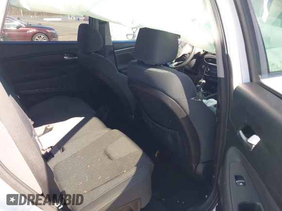 2019 Hyundai Santa Fe SEL z VIN 5NMS3CADXKH071437, wystawiony jako IAAI lot #41752902 z przebiegiem 66 980 mil mil oraz . Historia ofert i sprzedaży dostępna na DreamBid. Obrazek 8.