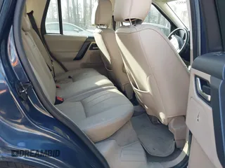 2012 Land Rover LR2 HSE z VIN SALFR2BN6CH303951, wystawiony jako IAAI lot #41465521 z przebiegiem 100 527 mil mil oraz . Historia ofert i sprzedaży dostępna na DreamBid. Obrazek 8.