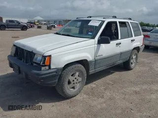 1994 Jeep Grand Cherokee Laredo with VIN 1J4FX58SXRC120936, listed as a IAAI auction lot 42530212 with 126,367 mi miles and . Bid and sale history available at DreamBid. Image 2.