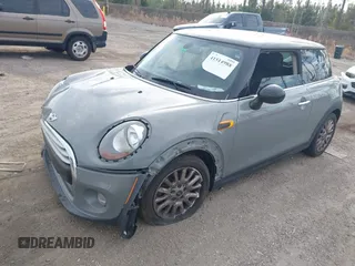2015 MINI Hardtop with VIN WMWXM5C59F3A58798, listed as a IAAI auction lot 41514988 with 127,771 mi miles and . Bid and sale history available at DreamBid. Image 2.