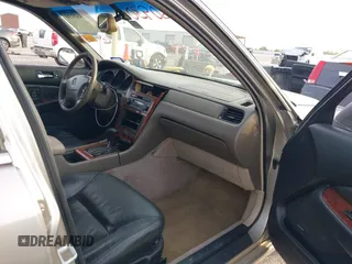 2002 Acura RL z VIN JH4KA96552C008589, wystawiony jako IAAI lot #41860930 z przebiegiem 210 847 mil mil oraz . Historia ofert i sprzedaży dostępna na DreamBid. Obrazek 5.