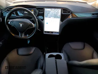 2015 Tesla Model S 85D with VIN 5YJSA1S21FF087461, listed as a Copart auction lot 87027334 with 53,868 mi miles and Salvage Title. Bid and sale history available at carsss.com. Image 8.