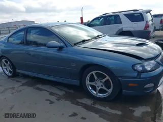2006 Pontiac GTO with VIN 6G2VX12UX6L561098, listed as a IAAI auction lot 41487635 with 69,741 mi miles. Bid and sale history available at carsss.com. Image 13.