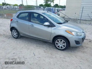 2011 Mazda 2 Sport with VIN JM1DE1HY0B0104123, listed as a IAAI auction lot 41959099 with 128,918 mi miles and . Bid and sale history available at DreamBid. Image 1.