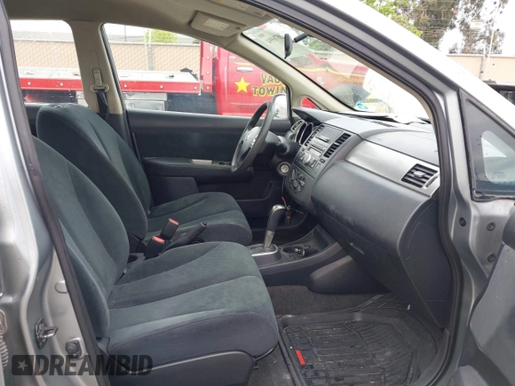 2011 Nissan Versa 1.8 S with VIN 3N1BC1AP0BL461824, listed as a IAAI auction lot 42076994 with 180,798 mi miles. Bid and sale history available at carsss.com. Image 5.