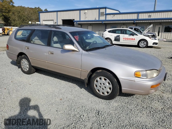1996 Toyota Camry z VIN 4T1EG12K8TU779386, wystawiony jako Copart lot #79189014 z przebiegiem 142 891 mil mil oraz Czysty tytuł • Clean title. Historia ofert i sprzedaży dostępna na DreamBid. Obrazek 4.