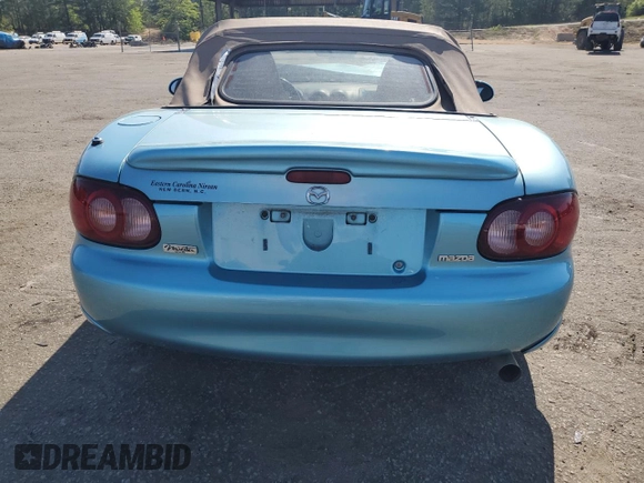 2001 Mazda MX-5 Miata z VIN JM1NB353910216600, wystawiony jako Copart lot #50916465 z przebiegiem Nie podano mil oraz Szkoda całkowita • Salvage title. Historia ofert i sprzedaży dostępna na DreamBid. Obrazek 6.