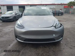 2024 Tesla Model Y Performance with VIN 7SAYGDEF3RA307468, listed as a IAAI auction lot 41805853 with 10,377 mi miles and . Bid and sale history available at DreamBid. Image 11.