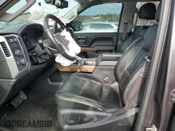 2015 GMC Sierra 2500HD SLT with VIN 1GT12ZEG1FF180216, listed as a Copart auction lot 77076384 with 67,751 mi miles and Salvage title. Bid and sale history available at DreamBid. Image 7.
