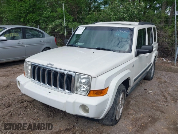 2007 Jeep Commander with VIN 1J8HG48N77C611652, listed as a IAAI auction lot 42144524 with 211,976 mi miles. Bid and sale history available at carsss.com. Image 2.