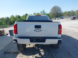 2016 Chevrolet Silverado 1500 LT with VIN 1GCVKREC4GZ106299, listed as a IAAI auction lot 41984118 with 181,626 mi miles and . Bid and sale history available at DreamBid. Image 16.