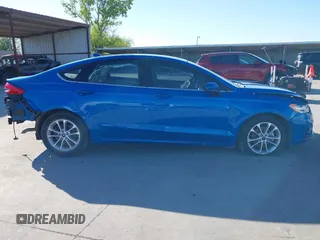 2020 Ford Fusion SE with VIN 3FA6P0H77LR153539, listed as a IAAI auction lot 42054318 with 103,820 mi miles and . Bid and sale history available at DreamBid. Image 14.