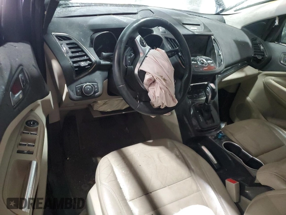 2015 Ford Escape Titanium with VIN 1FMCU9J93FUC86300, listed as a Copart auction lot 60852895 with 156,296 mi miles and Salvage title. Bid and sale history available at DreamBid. Image 8.