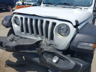 2018 Jeep Wrangler Unlimited Sport S with VIN 1C4HJXDN7JW232530, listed as a IAAI auction lot 42362544 with 89,972 mi miles and . Bid and sale history available at DreamBid. Image 6.