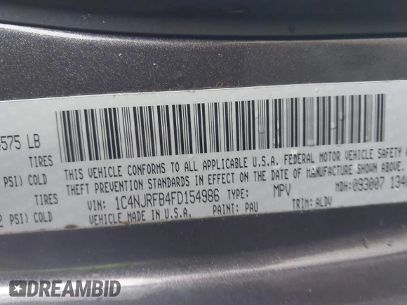 2015 Jeep Patriot Latitude with VIN 1C4NJRFB4FD154986, listed as a IAAI auction lot 41496724 with 131,700 mi miles and . Bid and sale history available at DreamBid. Image 9.
