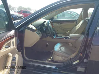 2012 Cadillac CTS Luxury z VIN 1G6DG5E58C0134874, wystawiony jako IAAI lot #42564120 z przebiegiem 121 053 mil mil oraz . Historia ofert i sprzedaży dostępna na DreamBid. Obrazek 5.