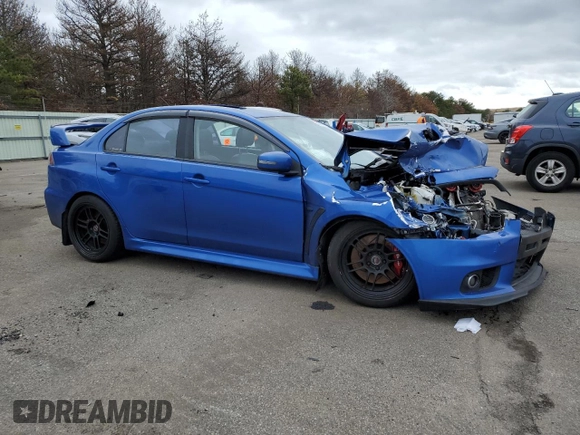 2015 Mitsubishi Lancer Evolution GSR z VIN JA32W8FV7FU023106, wystawiony jako Copart lot #40867084 z przebiegiem 103 964 mil mil oraz Szkoda całkowita • Salvage title. Historia ofert i sprzedaży dostępna na DreamBid. Obrazek 4.