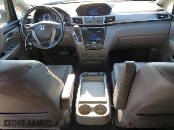 2016 Honda Odyssey Touring Elite with VIN 5FNRL5H9XGB006981, listed as a Copart auction lot 63970385 with 165,164 mi miles and Salvage title. Bid and sale history available at DreamBid. Image 8.