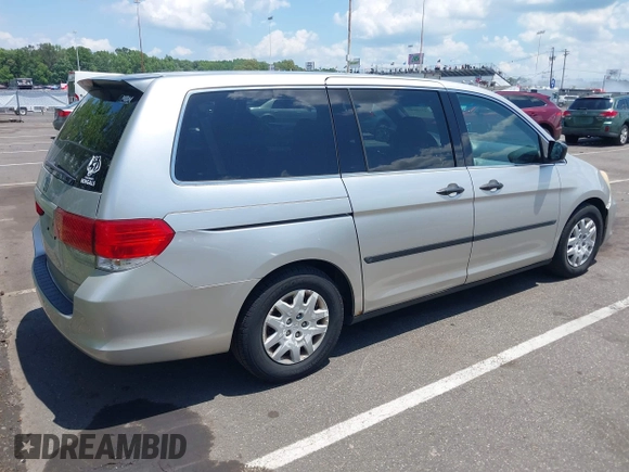 2008 Honda Odyssey LX z VIN 5FNRL382X8B056904, wystawiony jako IAAI lot #42530609 z przebiegiem 238 793 mil mil oraz . Historia ofert i sprzedaży dostępna na DreamBid. Obrazek 4.