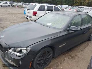 2015 BMW 7 Series 750i xDrive with VIN WBAYB6C57FD965802, listed as a IAAI auction lot 40588698 with 999,999 mi miles. Bid and sale history available at carsss.com. Image 13.