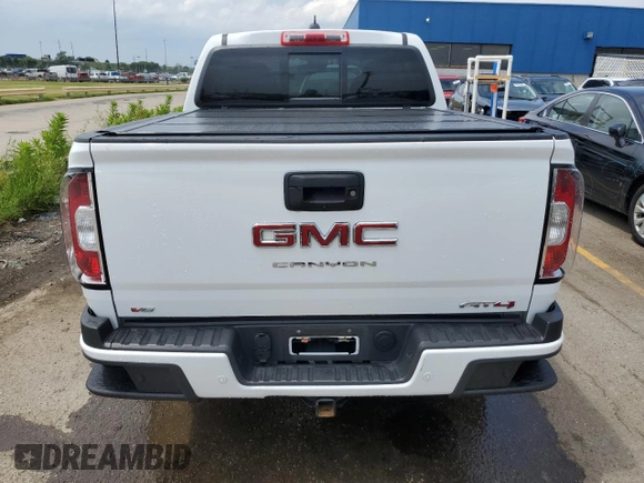2021 GMC Canyon 4WD AT4 w/Cloth with VIN 1GTG6FEN8M1295482, listed as a Copart auction lot 59433404 with 34,637 mi miles and Non Repairable. Bid and sale history available at carsss.com. Image 6.