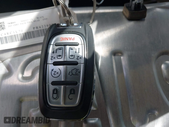 2023 Chrysler Pacifica Hybrid Touring L with VIN 2C4RC1L70PR622000, listed as a IAAI auction lot 42711826 with 65,109 mi miles and . Bid and sale history available at DreamBid. Image 11.