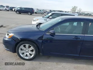 2014 Chrysler 200 Touring with VIN 1C3CCBBB2EN128771, listed as a IAAI auction lot 42148625 with 77,848 mi miles and . Bid and sale history available at DreamBid. Image 12.