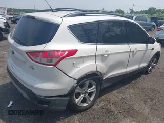 2013 Ford Escape SE z VIN 1FMCU9GXXDUD82847, wystawiony jako IAAI lot #42436360 z przebiegiem 142 071 mil mil oraz . Historia ofert i sprzedaży dostępna na DreamBid. Obrazek 4.