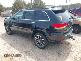 2017 Jeep Grand Cherokee Overland z VIN 1C4RJFCG4HC662884, wystawiony jako IAAI lot #42172826 z przebiegiem 79 305 mil mil oraz . Historia ofert i sprzedaży dostępna na DreamBid. Obrazek 3.
