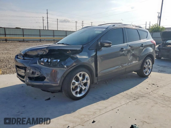 2015 Ford Escape Titanium with VIN 1FMCU0J97FUC88093, listed as a Copart auction lot 60854085 with 64,029 mi miles and Salvage title. Bid and sale history available at DreamBid. Image 1.