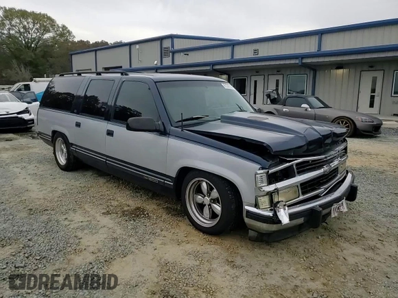 1994 GMC Suburban z VIN 1GKEC16K4RJ762562, wystawiony jako Copart lot #81242184 z przebiegiem 182 583 mil mil oraz Szkoda całkowita • Salvage title. Historia ofert i sprzedaży dostępna na DreamBid. Obrazek 11.
