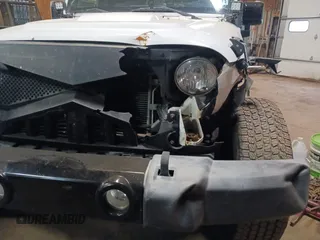 2015 Jeep Wrangler Unlimited Sahara with VIN 1C4BJWEG8FL696581, listed as a IAAI auction lot 41923093 with 193,421 mi miles and . Bid and sale history available at DreamBid. Image 6.