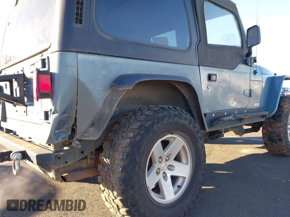 1998 Jeep Wrangler Sport with VIN 1J4FY19S4WP716469, listed as a IAAI auction lot 41506513 with 142,289 mi miles. Bid and sale history available at carsss.com. Image 6.