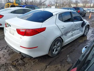 2015 Kia Optima LX with VIN KNAGM4A75F5644401, listed as a IAAI auction lot 41672679 with 217,636 mi miles. Bid and sale history available at carsss.com. Image 4.