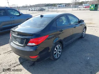 2017 Hyundai Accent SE with VIN KMHCT4AE1HU386384, listed as a IAAI auction lot 41656299 with 121,336 mi miles. Bid and sale history available at carsss.com. Image 4.