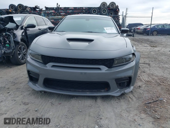 2023 Dodge Charger Scat Pack Widebody with VIN 2C3CDXGJ6PH646050, listed as a IAAI auction lot 41175513 with 7,684 mi miles and . Bid and sale history available at DreamBid. Image 12.