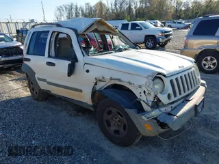 2005 Jeep Liberty Sport with VIN 1J4GK48KX5W679070, listed as a IAAI auction lot 41807899 with 157,726 mi miles. Bid and sale history available at carsss.com. Image 1.