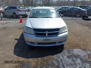 2008 Dodge Avenger SXT with VIN 1B3LC56K28N684317, listed as a IAAI auction lot 41988986 with 241,325 mi miles and . Bid and sale history available at DreamBid. Image 12.
