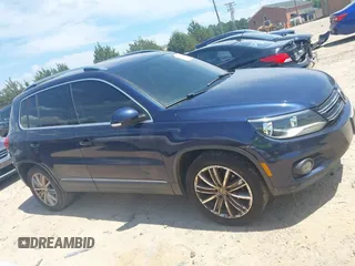 2012 Volkswagen Tiguan SE with VIN WVGAV7AX7CW534703, listed as a IAAI auction lot 42463358 with 119,699 mi miles and . Bid and sale history available at DreamBid. Image 13.