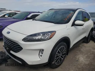 2021 Ford Escape Titanium Plug-In Hybrid z VIN 1FMCU0LZ6MUA53551, wystawiony jako Copart lot #76293904 z przebiegiem Nie podano mil oraz Nie do naprawy • Non repairable. Historia ofert i sprzedaży dostępna na DreamBid. Obrazek 1.
